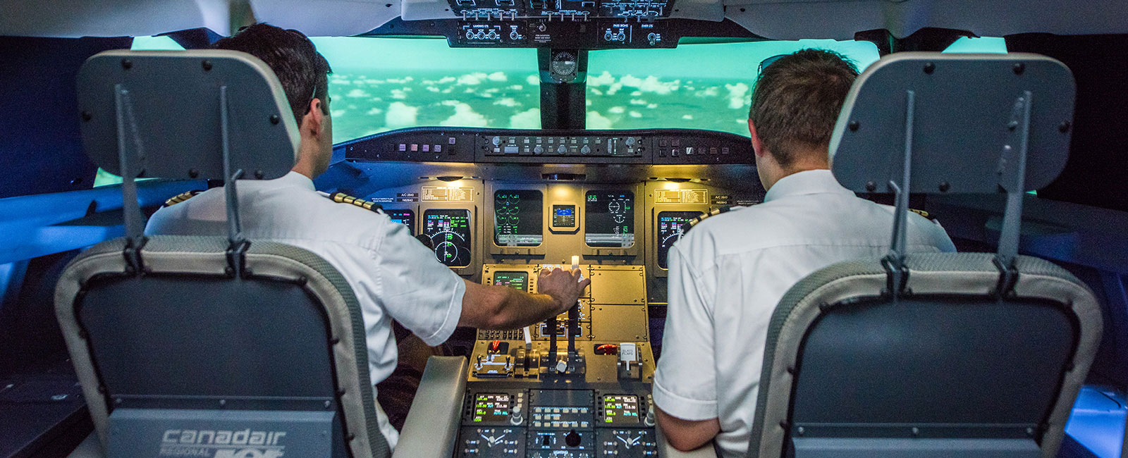 Two students piloting a plane