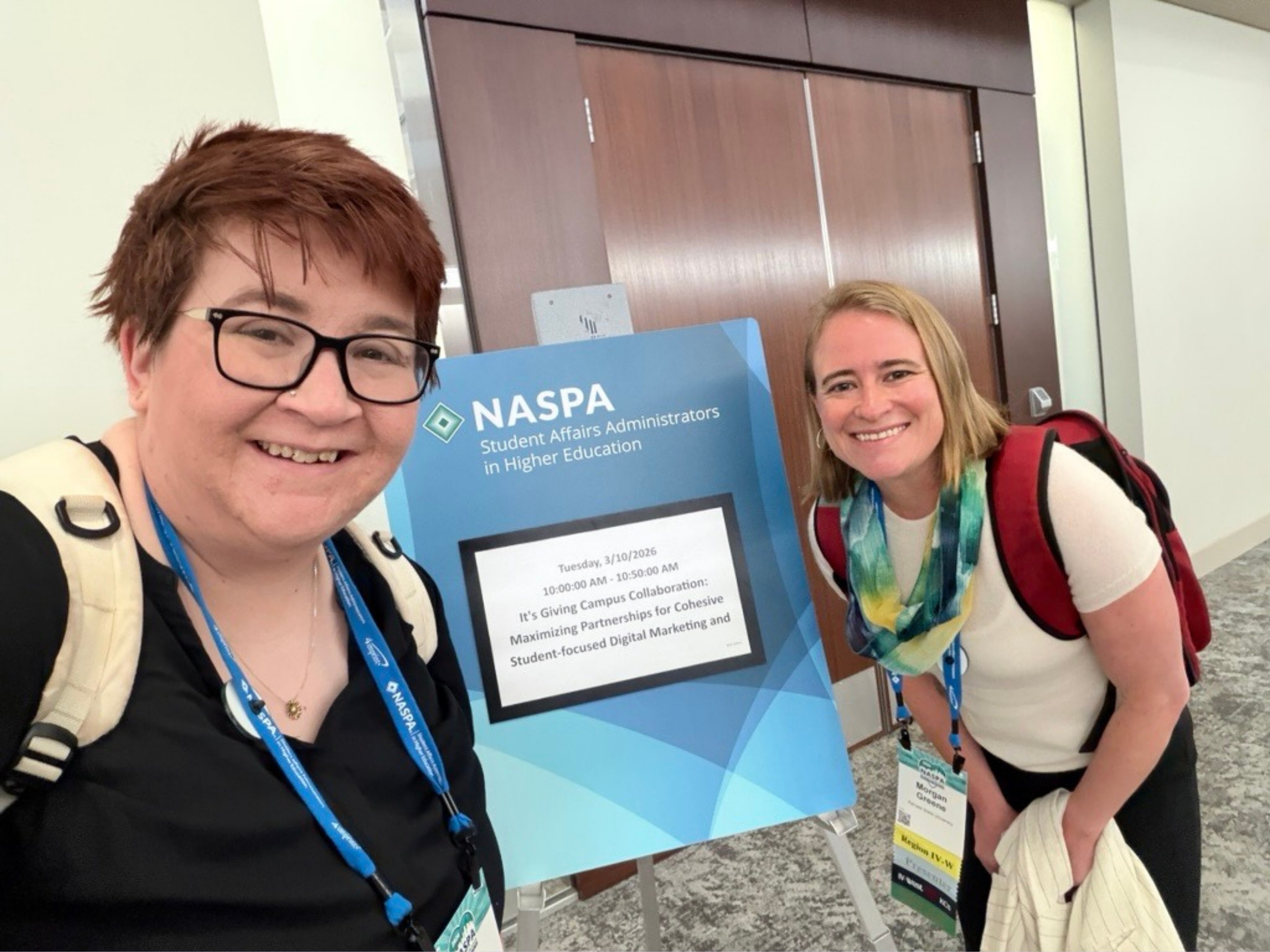 Morgan Greene and Emily McMillan pose together in front of a poster. It reads "NASPA" with their name and presentation title below.