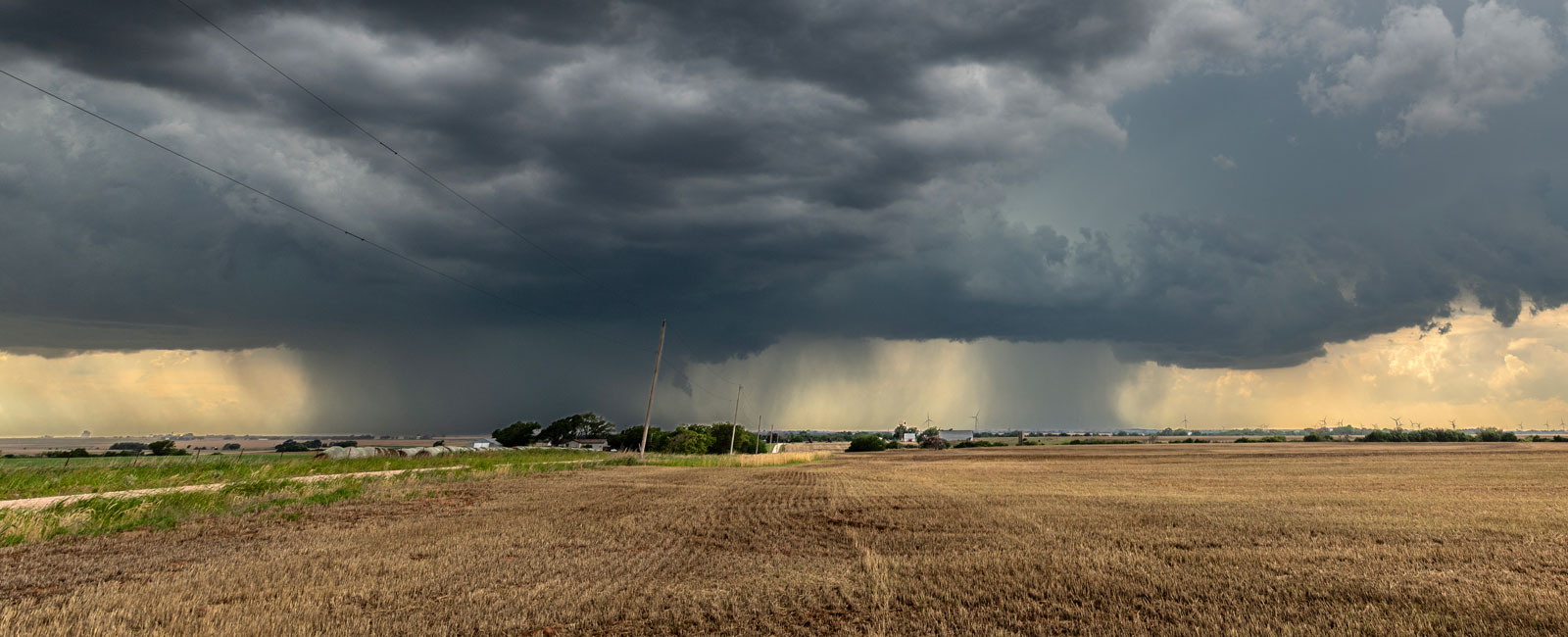 A storm forms in a rural area
