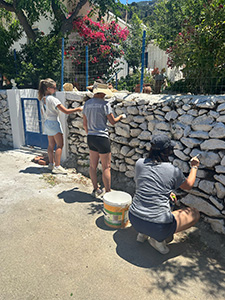 Students partook in community service and helped update the paint in the town in Amalo, Ikaria.