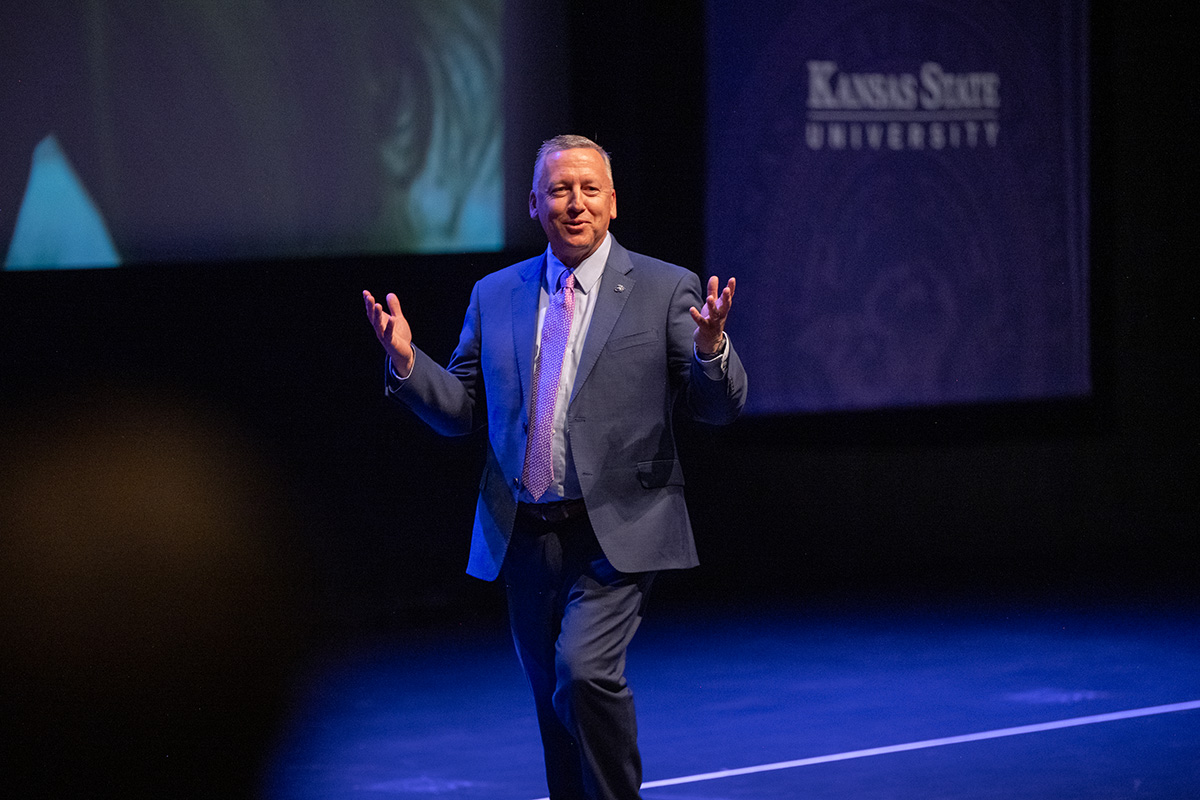 Richard Linton gesturing while presenting at 2026 State of Our University